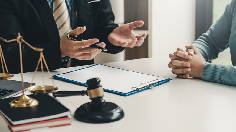 Estate lawyer explaining a beneficiary's inheritance