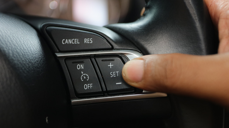 Cruise control button on a steering wheel