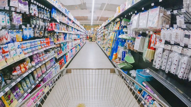 interior of grocery store with shopping cart