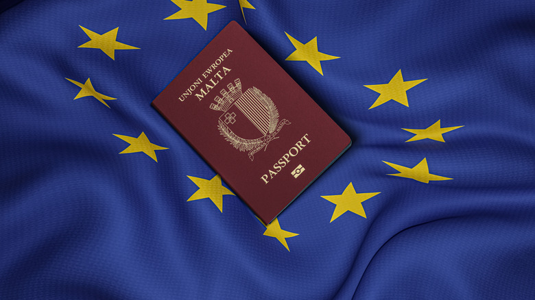 Malta passport with European Union flag, center, top view