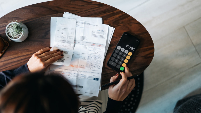 Person creating a budget.