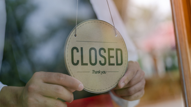 Closed sign outside cafe