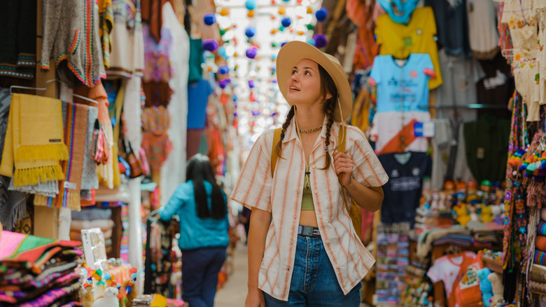 A woman souvenir shopping on vacation