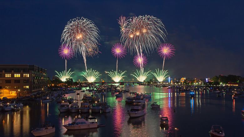 Fireworks going off over the Saginaw River in Bay City, Michigan