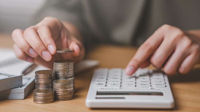 Woman counting her savings