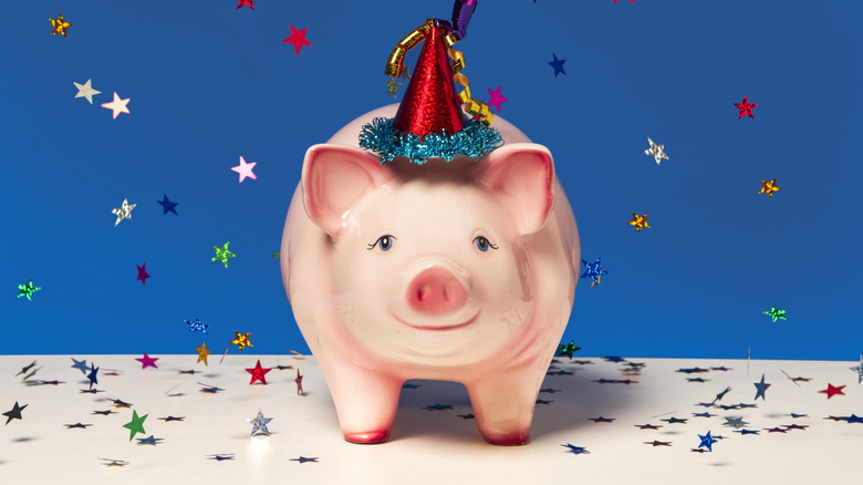 piggy bank wearing a party hat