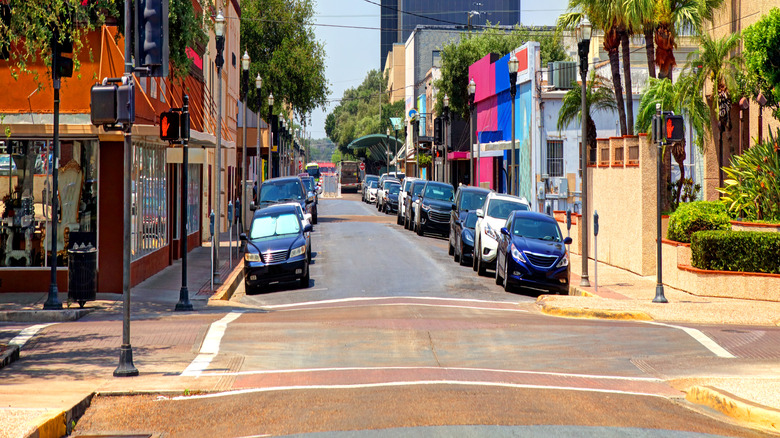 street scene in McAllen Texas with cars, buildings