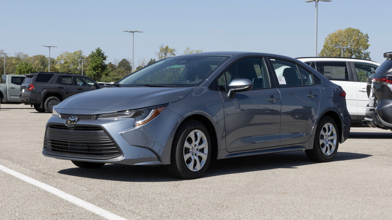 A grey Toyota Corolla parked in a dealership lot