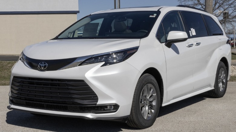 A 2026 white Toyota Sienna minivan parked on a lot.