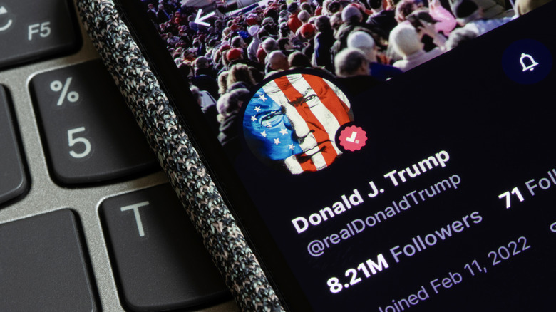 Donald Trump's social media profile page on a smartphone screen