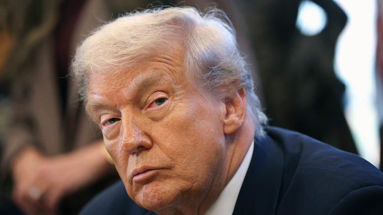 President Donald Trump staring to the side.