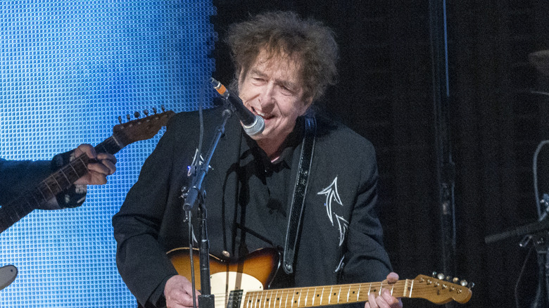 Bob Dylan performing at an event