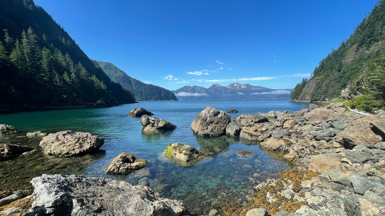 Nature scape with mountains in background, lake in foreground