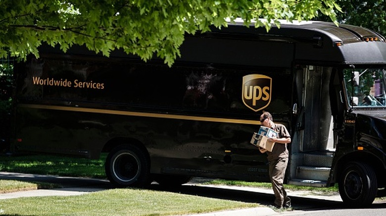 A UPS driver makes a delivery in Rochester, Michigan