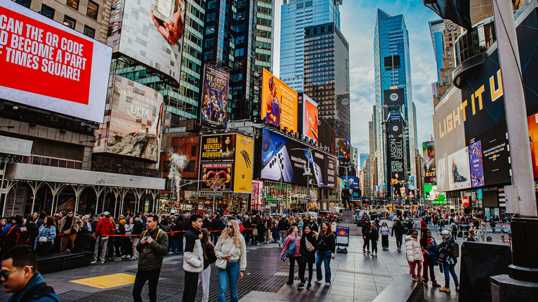 Daytime image of a crowded Time Square