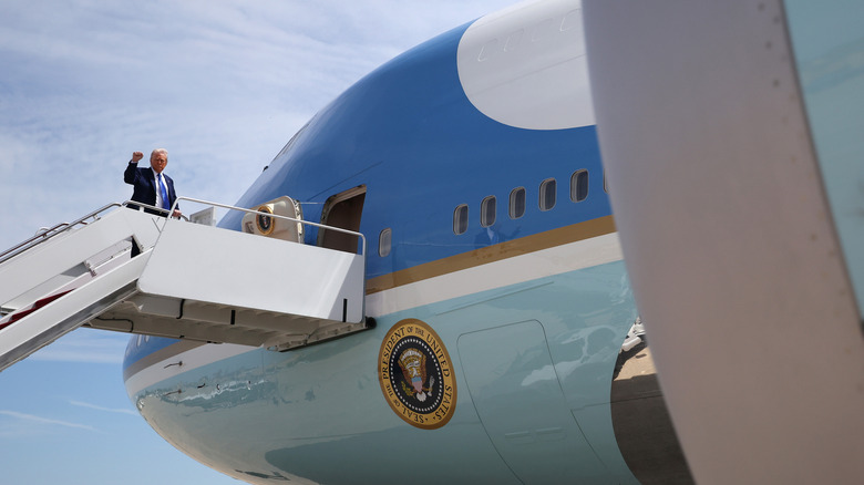 U.S. President Donald Trump boards Air Force One on May 12, 2025, at Joint Base Andrews, Maryland.