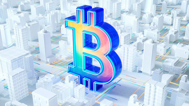Bitcoin sign floating above virtual big city