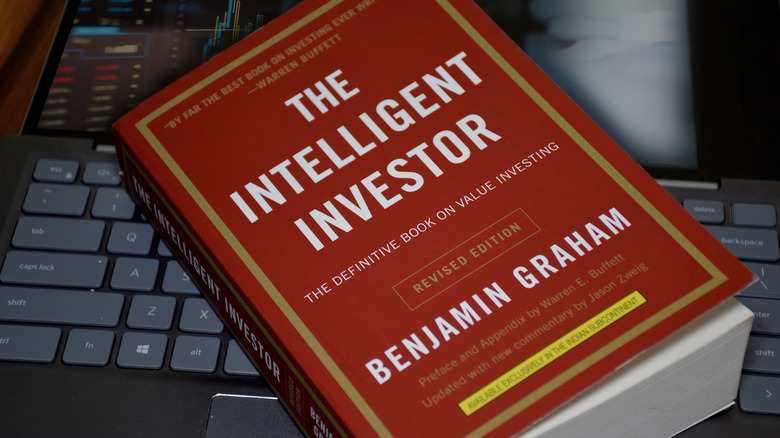 Benjamin Graham's book on a keyboard