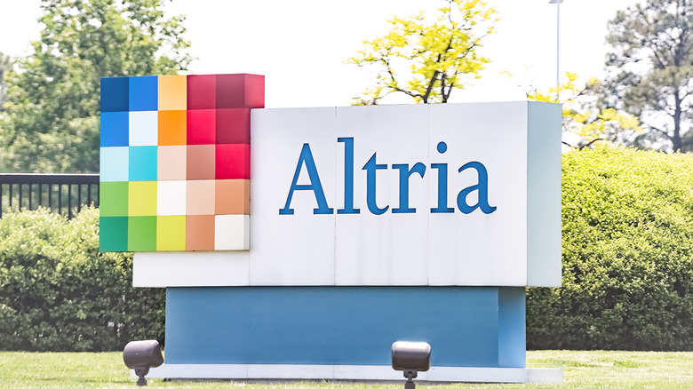 an Altria building sign with rainbow pattern