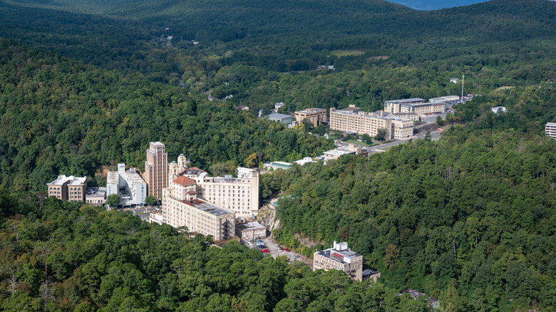 Aerial view of downtown Hot Springs Arkansas, surrounded by woodson hills