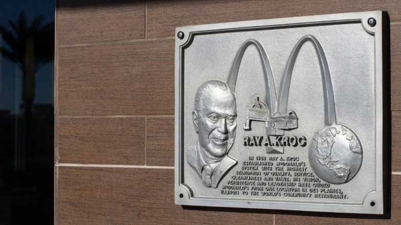 A plaque dedicated to Ray Kroc on the headquarters building of the McDonald's corporation.