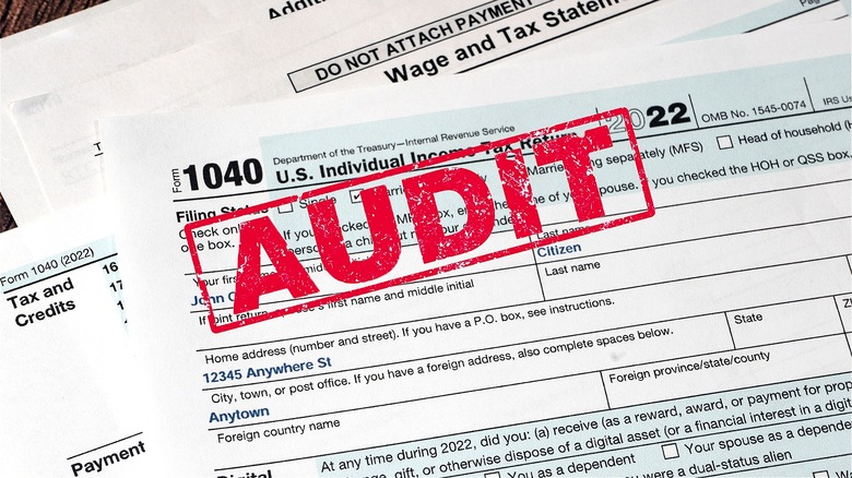 Tax forms stamped with "AUDIT"