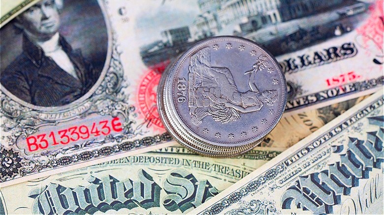 Old U.S. currency and coins
