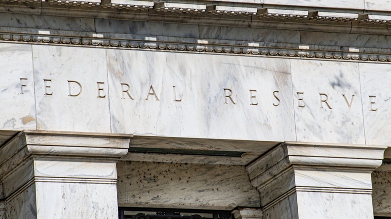 United States Federal Reserve building with columns and "Federal Reserve" engraved on its freize