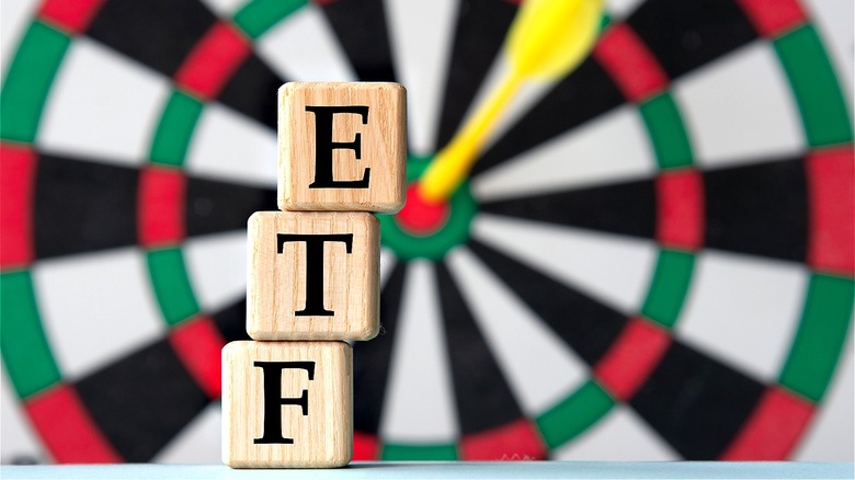"ETF" blocks and dartboard background