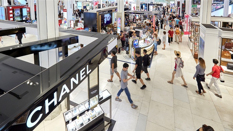 Shoppers inside busy mall