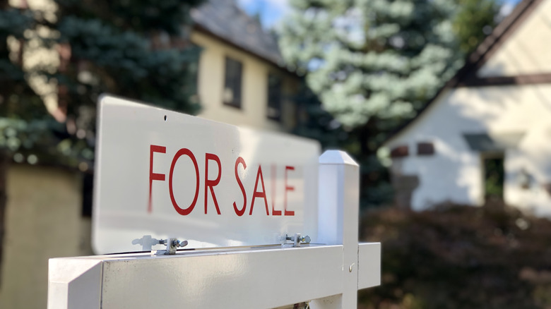 A for sale sign outside of a home