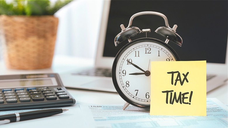 Alarm clock with tax reminder
