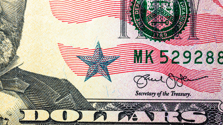 Close up macro detail of United States Dollars banknotes