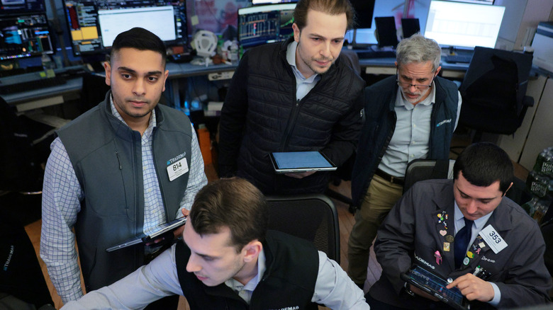 Traders working on the NYSE floor