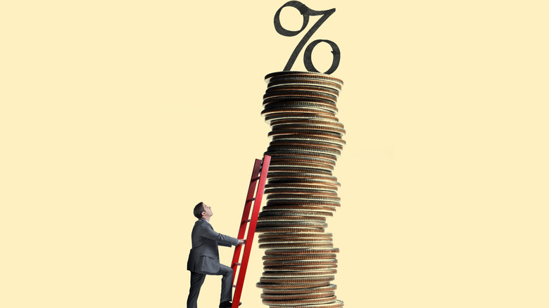 percentage symbol on coin stack