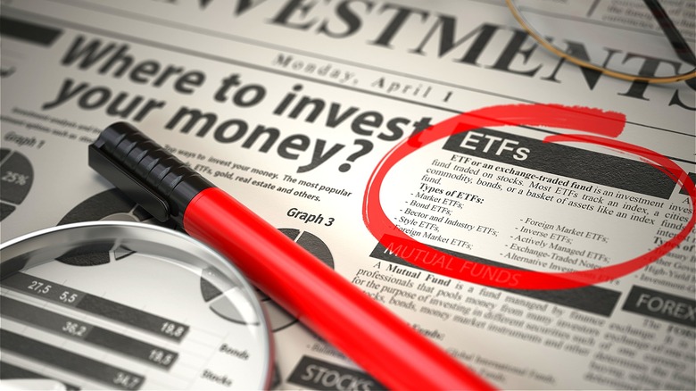 Financial newspaper with ETFs circled