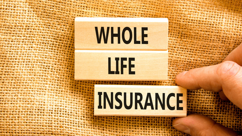 Whole life insurance on wooden blocks.