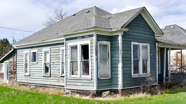 an abandoned house in need of care