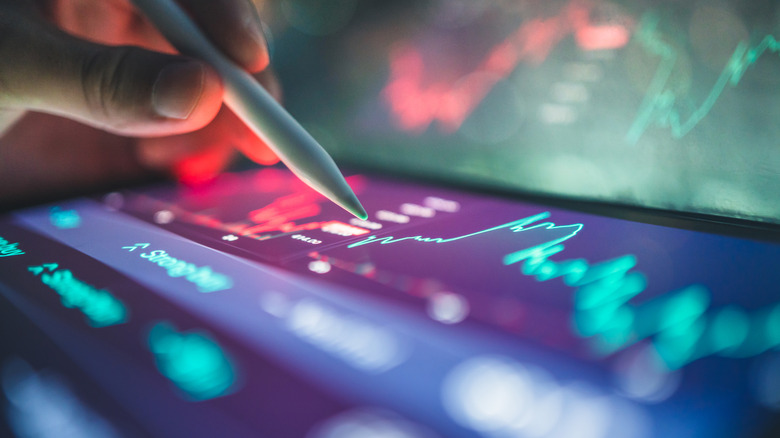 tablet showing the stock market ticker