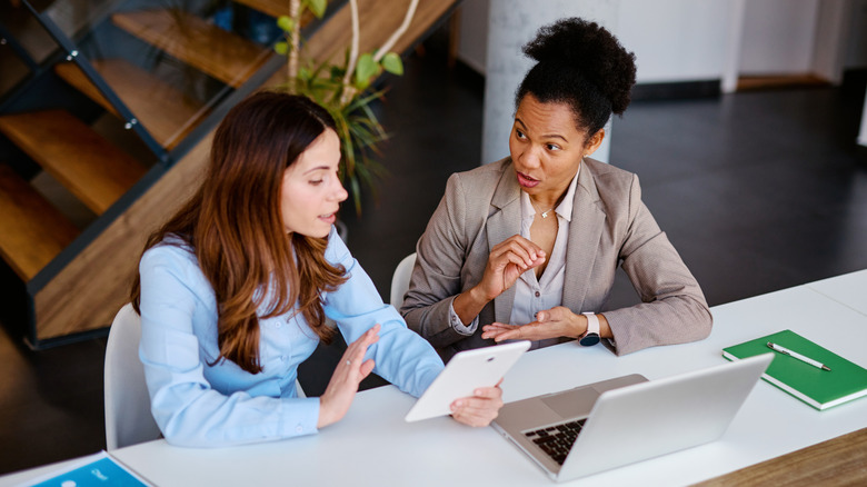 women working with a financial advisor