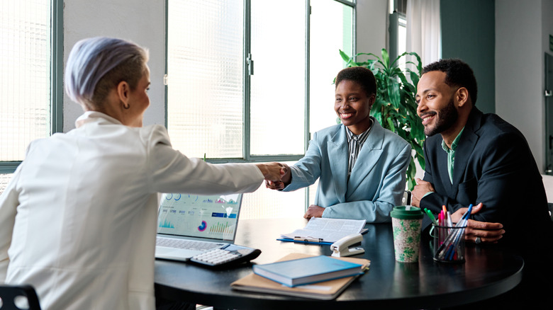 couple meeting with a financial planner