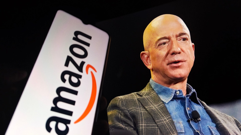 Jeff Bezos with Amazon logo.