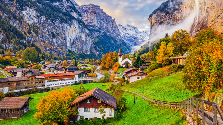 Shot of picturesque Switzerland town with mountains in the background
