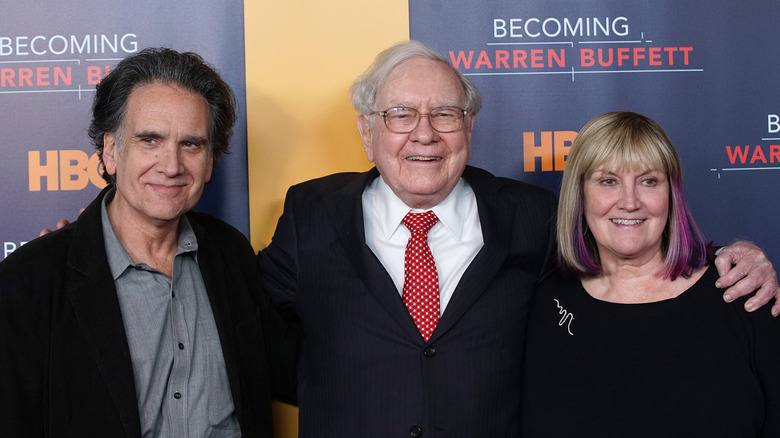 Warren Buffett with son Peter and daughter Susan before launch of premiere