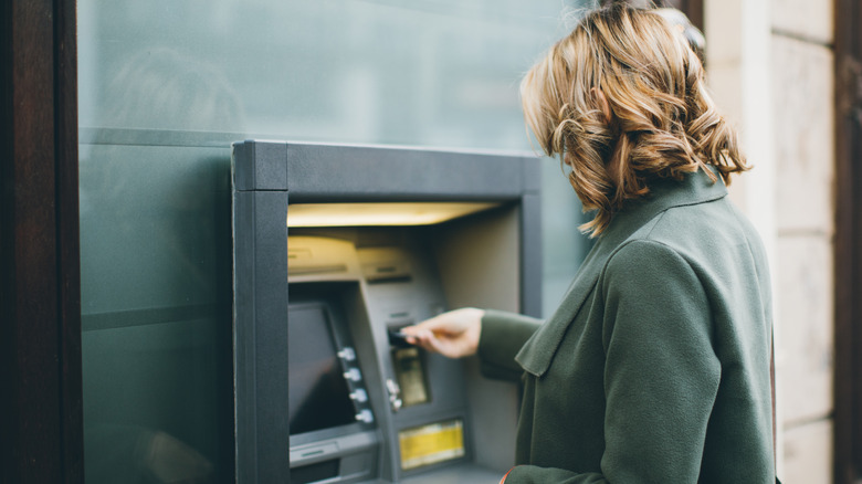 Woman using an ATM