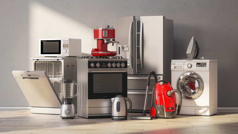 a collection of kitchen appliances, large and small