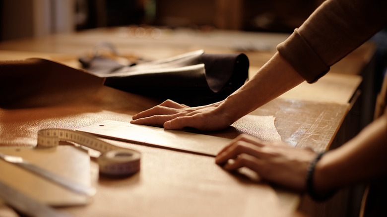 A person building custom furniture