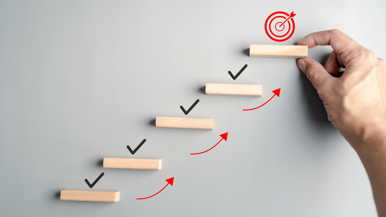 Blocks ascending toward a target