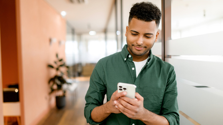 A man using phone to call someone