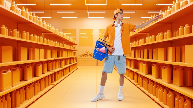 Man shopping in orange supermarket